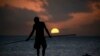 FILE - An Aboriginee is seen spear fishing in Australia's Northern Territory.