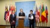 Motohide Yoshikawa, left, Japan's ambassador to the United Nations, and South Korea's Ambassador Oh Joon, right, listen as Samantha Power, center, the U.S. ambassador, makes comments to the media following a Security Council meeting at U.N. headquarters, Sunday, Feb. 7, 2016.