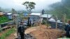 ARCHIVO - Esta foto de archivo difundida por la Policía nacional de Ecuador ene julio de 2019 muestra un asentamiento de minería de oro ilegal durante un operativo en Buenos Aires, Ecuador.