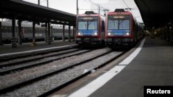 Local trains stand by next to empty platforms at Gare d'Austerlitz railway station in Paris after 25 days of strike by all unions of the Paris transport network (RATP) and French SNCF workers, Dec. 29, 2019.