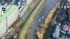 In this image made off a video released by Miyagi Prefectural Police, water rushes up Sunaoshi river in Tagajo, Miyagi prefecture, Nov. 22, 2016.