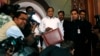 Indian Finance Minister Palaniappan Chidambaram, center, arrives at Parliament to present the annual budget in New Delhi, February 28, 2013.