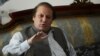 Pakistan's incoming prime minister Nawaz Sharif speaks to journalists at his farm house in Raiwind on the outskirts of Lahore, May 13, 2013. 