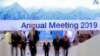 People walk up stairs at the congress center where the annual meeting of the World Economic Forum 2019, WEF, take place in Davos, Jan. 20, 2019. 