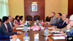 In this photo released by the Foreign Office, Special Representative for Afghanistan Reconciliation Zalmay Khalilzad, third from right, holds talks with Pakistani officials at the Foreign Minister in Islamabad, Pakistan, June 2, 2019.