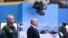 ប្រធានាធិបតី​រុស្ស៊ី​លោក Vladimir Putin និង​រដ្ឋមន្ត្រី​ការពារ​ជាតិ​លោក Sergei Shoigu ចូលរួម​ក្នុង​ការតាំង​ពិព័រណ៍​យោធា​មួយ មុន​ពេល​កិច្ចប្រជុំ​​​នៃ​ក្រុមប្រឹក្សា​ក្រសួង​ការពារ​ជាតិ​ក្នុង​ទីក្រុង​មូស្គូ ប្រទេស​រុស្ស៊ី នៅ​ថ្ងៃទី២១ ខែធ្នូ ឆ្នាំ២០២១។