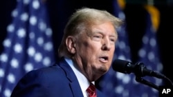 El candidato presidencial republicano, el expresidente Donald Trump, habla en un mitin de campaña el 9 de marzo de 2024 en Rome, Georgia, EEUU.