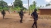 FILE - Rwandan soldiers patrol in the village of Mute, in Cabo Delgado province, Mozambique, Aug. 9, 2021, in this image made from video. 