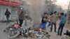 Bangladeshi Islamist activists vandalise motor bikes in Barisal, some 142 kms south the capital Dhaka, March 4, 2013.