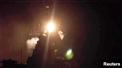 Three Tomahawk Land Attack Missiles (TLAM) launched off the USS Donald Cook head toward their targets in Iraq early March 20, 2003, beginning the U.S. offensive against Saddam Hussein. 