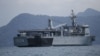 FILE - A Malaysian navy vessel patrols waters near Langkawi Island, May 16, 2015. Malaysia is buying four ships from China to help it patrol its coastline.