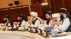 Members of the Taliban attend the second day of the Intra Afghan Dialogue talks in the Qatari capital, Doha, July 8, 2019. 