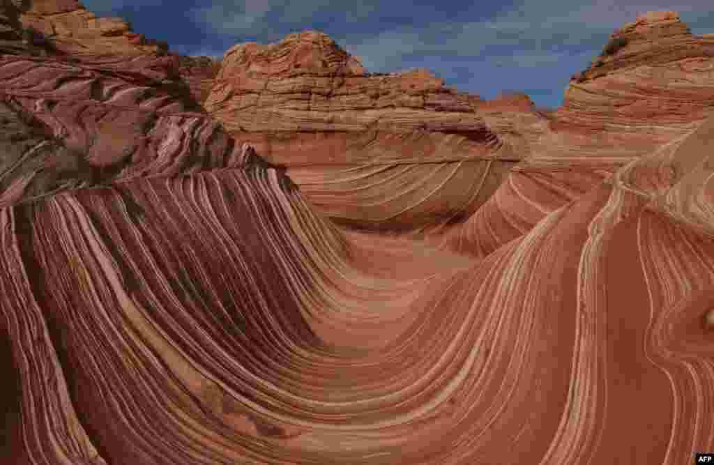 The unique U-shaped troughs of 'The Wave' rock formation are seen at the Coyotes Buttes North wilderness area near Page, Arizona, Oct. 30, 2017.