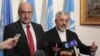 International Atomic Energy Agency chief inspector Herman Nackaerts (L) and Iran's IAEA ambassador Ali Asghar Soltanieh brief the media after a meeting at the Iranian embassy in Vienna, August 24, 2012.