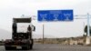 A truck drives on the main road linking Hodeidah with Sanaa, Yemen, Sept.13, 2018. 