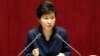 FILE - South Korean President Park Geun-hye delivers a speech at the National Assembly in Seoul, South Korea, following North Korea's recent nuclear test and long-range rocket launch. 