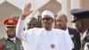 FILE - Nigeria President Muhammadu Buhari, waves after a meeting in Abuja, Nigeria, Monday, Jan. 9, 2017. 
