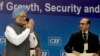 Indian Prime Minister Manmohan Singh greets top business leaders, as President of the Confederation of Indian Industry Adi Godrej watches in New Delhi, April 3, 2013.