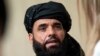 FILE - Suhail Shaheen, spokesman for the Taliban's political office in Doha, speaks to the media in Moscow, Russia, May 28, 2019.