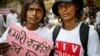 People affected with HIV participate in a protest rally to oppose a free trade agreement between India and European Union, in New Delhi, India , April 10, 2013.