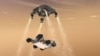 FILE - Though unable to test their rover’s entire landing system under Martian conditions, mission engineers at NASA’s Jet Propulsion Laboratory safely and precisely placed the Curiosity rover on the surface of Mars. (NASA/JPL-Caltech)