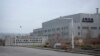 FILE - An SAIC Volkswagen plant is seen in the outskirts of Urumqi in northwestern China's Xinjiang Uyghur Autonomous Region, April 22, 2021. The European Union has moved closer to banning products made from forced labor.