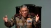 FILE - Indian Army Chief Bipin Rawat speaks during a press conference ahead of Army Day in New Delhi, India, Jan. 12, 2018.
