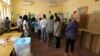 Voters queue up to cast ballots in presidential elections in Luanda, Angola, Aug. 23, 2017. Defense Minister, Joao Lourenco was the front-runner to succeed President Jose Eduardo dos Santos, who will step down after 38 years in power. 