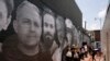 Un mural representa a rehenes estadounidenses y detenidos de manera injusta en el extranjero, en una imagen del 20 de julio de 2022, en el barrio de Georgetown en Washington. El 9 de marzo de 2024 marca el primer Día del Rehén y el Detenido Injusto en Estados Unidos.