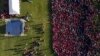 Thousands of opposition party supporters cheer leading opposition challenger Nelson Chamisa during a campaign rally in Bulawayo, Zimbabwe, July 21, 2018.