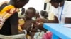 FILE - A child with suspected malnutrition is examined at a nutrition program clinic in Malakal, South Sudan, July 25, 2014. Chris Hillbruner of FEWSNET, a famine early warning system, said at the time that South Sudan was experiencing "the worst food security emergency in the world."