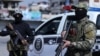 Syrian forces man a checkpoint in the coastal city of Latakia on March 8, 2025. (Syrian Arab News Agency via AFP)