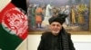 FILE - Afghanistan's President Ashraf Ghani speaks during a live TV broadcast at the presidential palace in Kabul, Afghanistan, Jan. 28, 2019. 