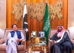 In this Oct, 15, 2019, photo released by Saudi Press Agency, SPA, Saudi Arabia's Crown Prince Mohammed bin Salman, right, meets with Pakistani Prime Minister Imran Khan, in Riyadh, Saudi Arabia.