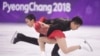 平昌冬奥会花样滑冰双人滑决赛中的中国组合隋文静和韩聪。他们演绎经典曲目《图兰朵》，摘得银牌。