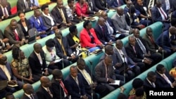FILE - Ugandan lawmakers are seen gathered in parliament, in Kampala, Uganda, Sept. 21, 2017.