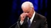 Former Vice President Joe Biden wipes a tear away while giving a tribute during memorial service at North Phoenix Baptist Church for Sen. John McCain, R-Ariz., on Aug. 30, 2018, in Phoenix, Ariz. 