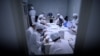 TOPSHOT - Researchers work in a lab at the Yisheng Biopharma company in Shenyang, in China’s northeast Liaoning province on June 10, 2020. - The company is one of a number in China trying to develop a vaccine for the COVID-19 coronavirus. (Photo by…