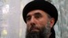 FILE - Gulbuddin Hekmatyar speaks to a reporter in 2002.