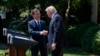 South Korean President Moon Jae-in shakes hands with President Donald Trump, right, after making statements in the Rose Garden of the White House in Washington, June 30, 2017. 