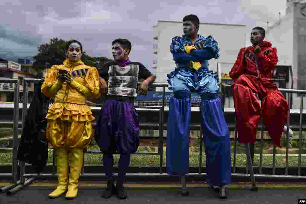 Colombian salsa dancers wait backstage prior to the &quot;Salsodromo&quot; parade in Cali, Colombia, Dec. 25, 2017.