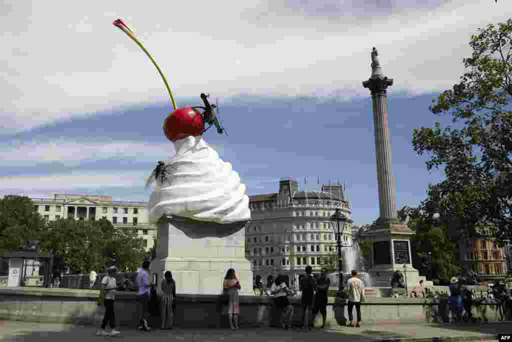 A new work of art entitled &#39;The End&#39; by British artist Heather Phillipson is unveiled on the fourth plinth in Trafalgar Square in London.