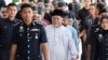 CEO Global Ikhwan Services and Business Holdings (GISB) Nasiruddin Mohd Ali tiba di pengadilan Selayang untuk menghadiri sidang pembacaan dakwaan, di Selayang, Malaysia, Rabu, 23 Oktober 2024. (Foto: Hasnoor Hussain/Reuters)
