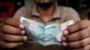 The Indian rupee recently lost nearly 20 percent of its value, a move that could further slow growth in Asia’s third largest economy, September 2013.