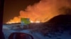 A volcano spews lava and smoke as it erupts, near Grindavik, Iceland, Feb. 8, 2024 in this still image obtained from social media video. (Marc Gibbons via REUTERS).