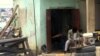 A building slated for destruction in Mpape, an informal settlement in the Nigerian capital, August 1, 2012. (Heather Murdock/VOA)