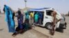 FILE - Ethiopian migrants are evacuated to the Red Sea port of Hodeida to board a ship to leave Yemen, June 2, 2018. 