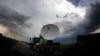 FILE - NOAA mobile doppler radar system tracks tornadic thunderstorm in Clearwater, Kansas, May 19, 2013.