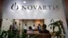 People gather at Novartis India headquarters in Mumbai April 1, 2013.