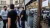 A currency exchange office in the Iranian capital, Tehran, August 2018. Iran’s government has launched a crackdown on people accused of profiteering from the rial’s recent slump against the dollar and other economic problems.